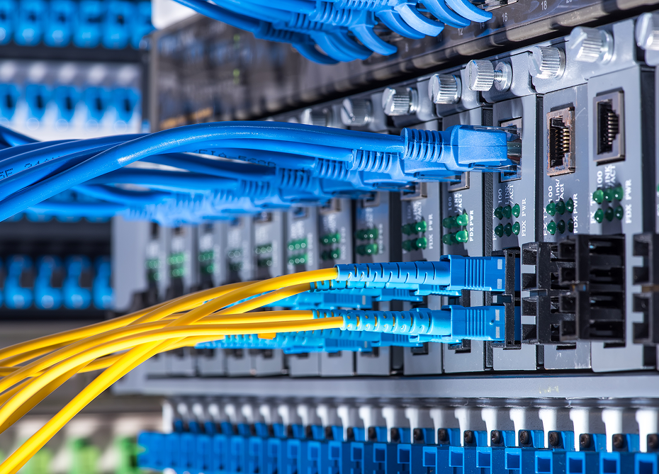Network cables connected to server rack.